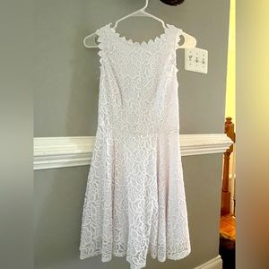 Lacy white dress. Worn once for graduation pictures.